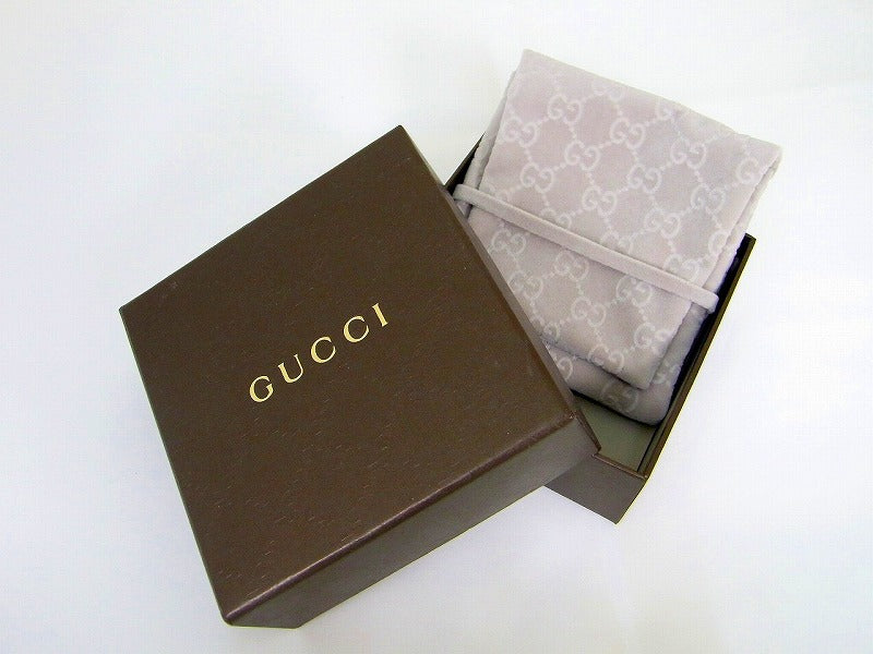 Gemelos Gucci Tag en Plata de Ley
