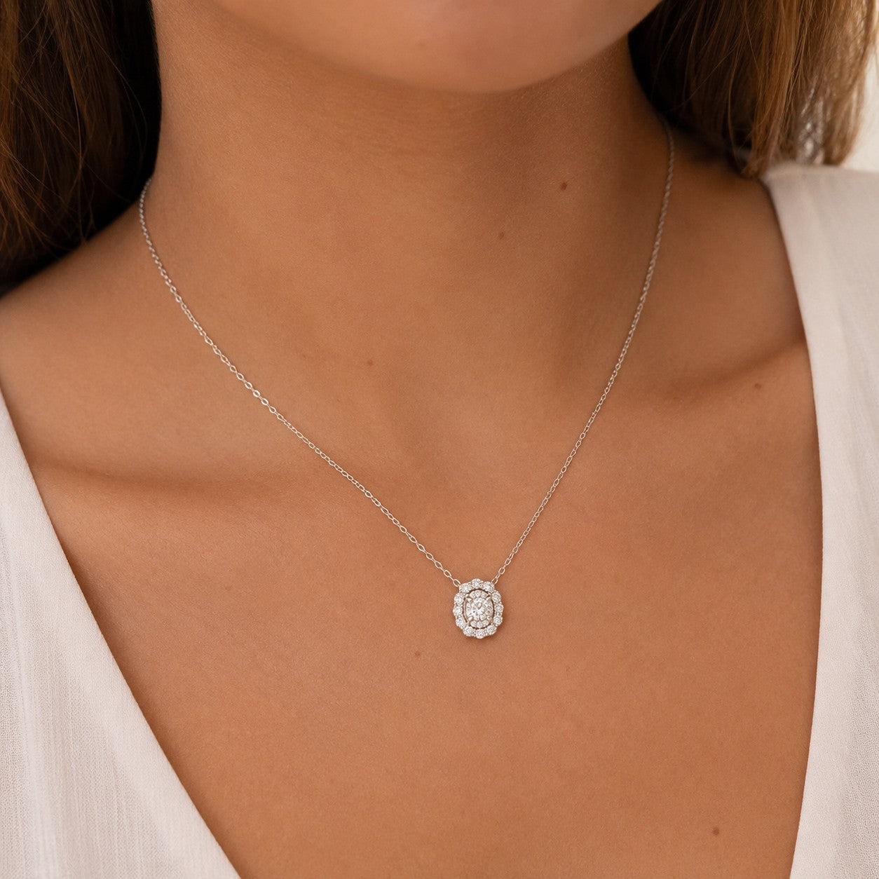 COLGANTE DE ORO BLANCO CON DIAMANTES