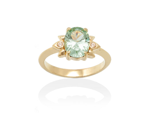 anillo de plata chapada con circonita coñac y piedra sintetica color verde agua