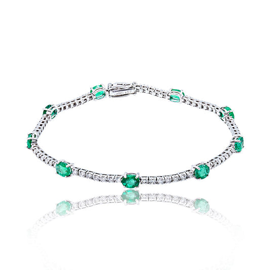 Riviere Bracelet with oval Emeralds and Diamonds